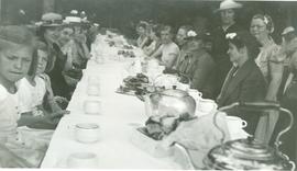 Group of people sitting down for a meal