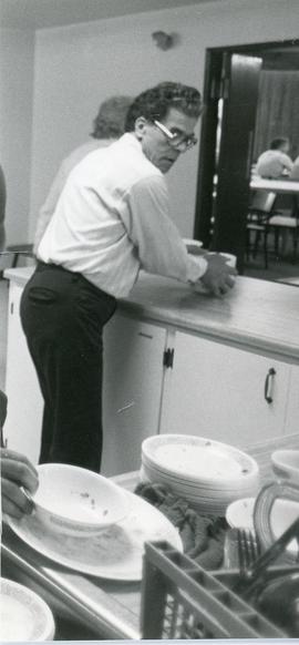Sylvester Dirks doing dishes