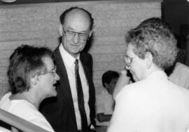 J.H. Quiring visits with others