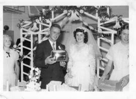 Len and Esther open gifts at their wedding
