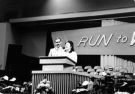 Ewald Unruh and [Joy Peters?] behind the pulpit