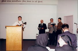 Jacob Bartsch leads singing; Pastor Peter Reimer, Wilbert Friesen, Bill Friesen, left