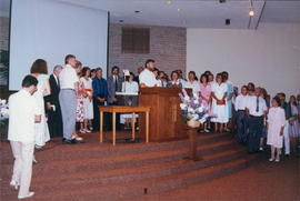 Missionary presentation; Willie Stoesz at microphone