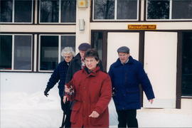 Walking from hall to cabins: Tina & Henry Kornelson, Clara & John Koop