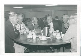 Lunch: John P. Kornelson, C.F.Dueck, Dave Schellenberg, P.L.Friesen, ?, John K. Reimer