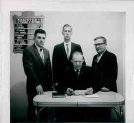 Executive: L-R John Koop, Dave Dueck, Edwin Wright; seated Abe Giesbrecht