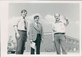 L to R: Haravey Plett, Henry Klassen, Ed Loewen, viewing Campus expansion