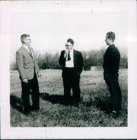 Lot purchases for new church, early 1960s.L-R:Wilbert Kroeker,N.A.Dueck,Harold Dueck