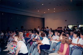 crowd scene (seated)