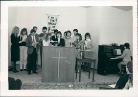 Young adult group singing