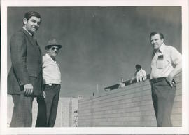 L-R: Harvey Plett, Roy Krentz, sub-contractor, John Wiebe, at chapel/music building