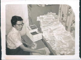 Doris Thiessen preparing "El Mensajaro" for mailing - 2 photos
