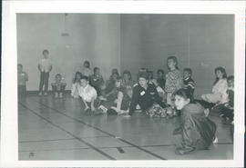 Youth and children enjoying games in the gym - 5 photos
