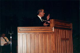 Vern Heidebrecht (seated), moderator Harvey Plett