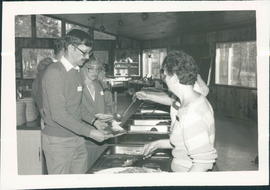 Food line.  LeRoy Barkman and Connie Peachey being served