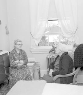 Two women talking in a room at Braeside Home in Preston, Ontario