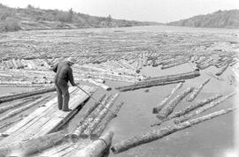 Geo Gordon Company grading lumber at sawmill on Murdock River, Ontario