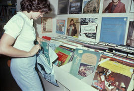 Girl stealing a record