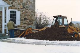 Digging along foundation at Brubacher House