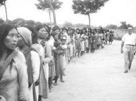 Nivacle women at Neu-Halbstadt lining up to receive clothing