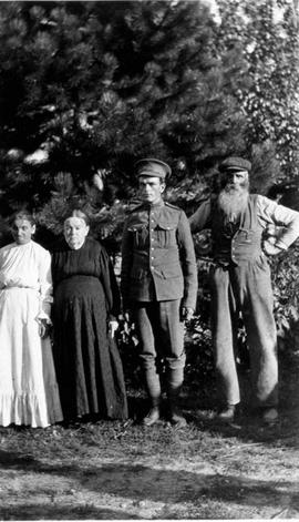 Gordon Eby with parents and sister