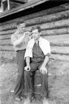 Men cutting hair at Montreal River