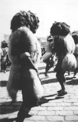 Indigenous men dancing in Bolivia