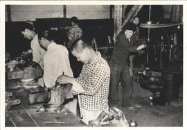 Students of the Mennonite Vocational School learning metalwork