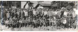 Students of the Mennonite Vocational School for orphan boys with Ernest T. Nash, director of Kore...
