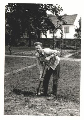 Harold Nissley preparing the ground for planting at Bad Duerkheim Children's Home