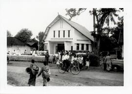 Christians leaving a service at the newly completed Javanese Mennonite Church building