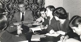 Pax worker with German students