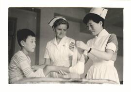 MCC nurse Tina Letkeman giving instructions to a student nurse at the Presbyterian Hospital in Taegu