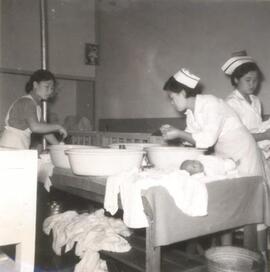 Nurses bathing babies at Seoul Children's Relief Hospital