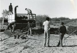 Randy Ewert helping Tsaawe village men (Botswana)