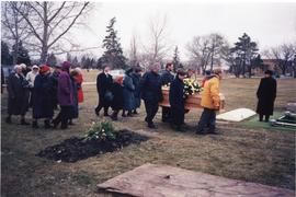 The coffin being carried to the gave site, 1998