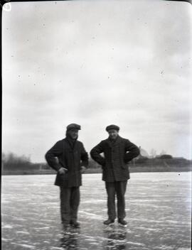 Two men on ice skates