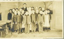 Jacob G. Neufeld with his students in Bergfeld, MB