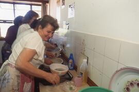 Women washing dishes
