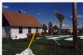 Putting up tent, Matheson Island