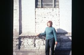 Kathy Boldt outside of a 20th century Evangelical Mennonite Church in Sagradovka