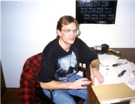 Chris Franz sitting at desk