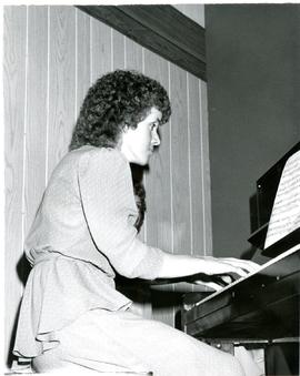 Verna Wiebe at the piano
