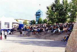 Crowd at the 125th Anniversary at the forks sitting on the steps.