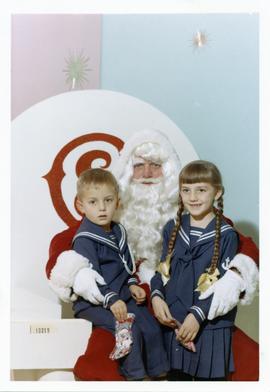 Anne Gret and Karl Heinz Wiebe with Santa