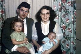 Henry and Elna Neufeld with children Carol and Gerald