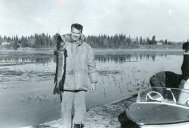 Man with Fish at Cross Lake