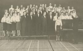 Menno Neufeld conducting fourty four Choir Members